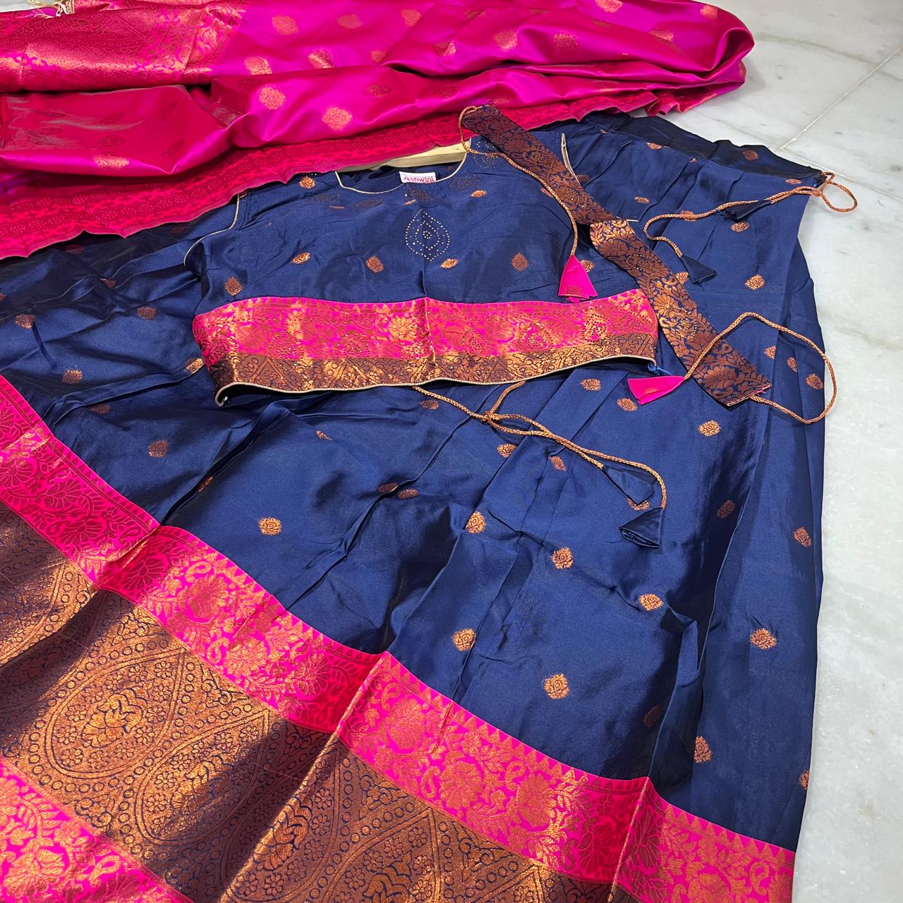 Traditional navy blue lehenga with a striking pink zari dupatta & belt