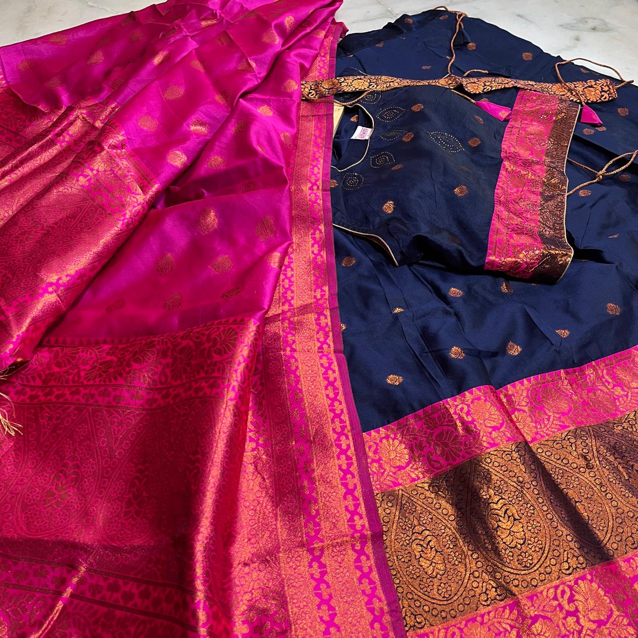 Traditional navy blue lehenga with a striking pink zari dupatta & belt