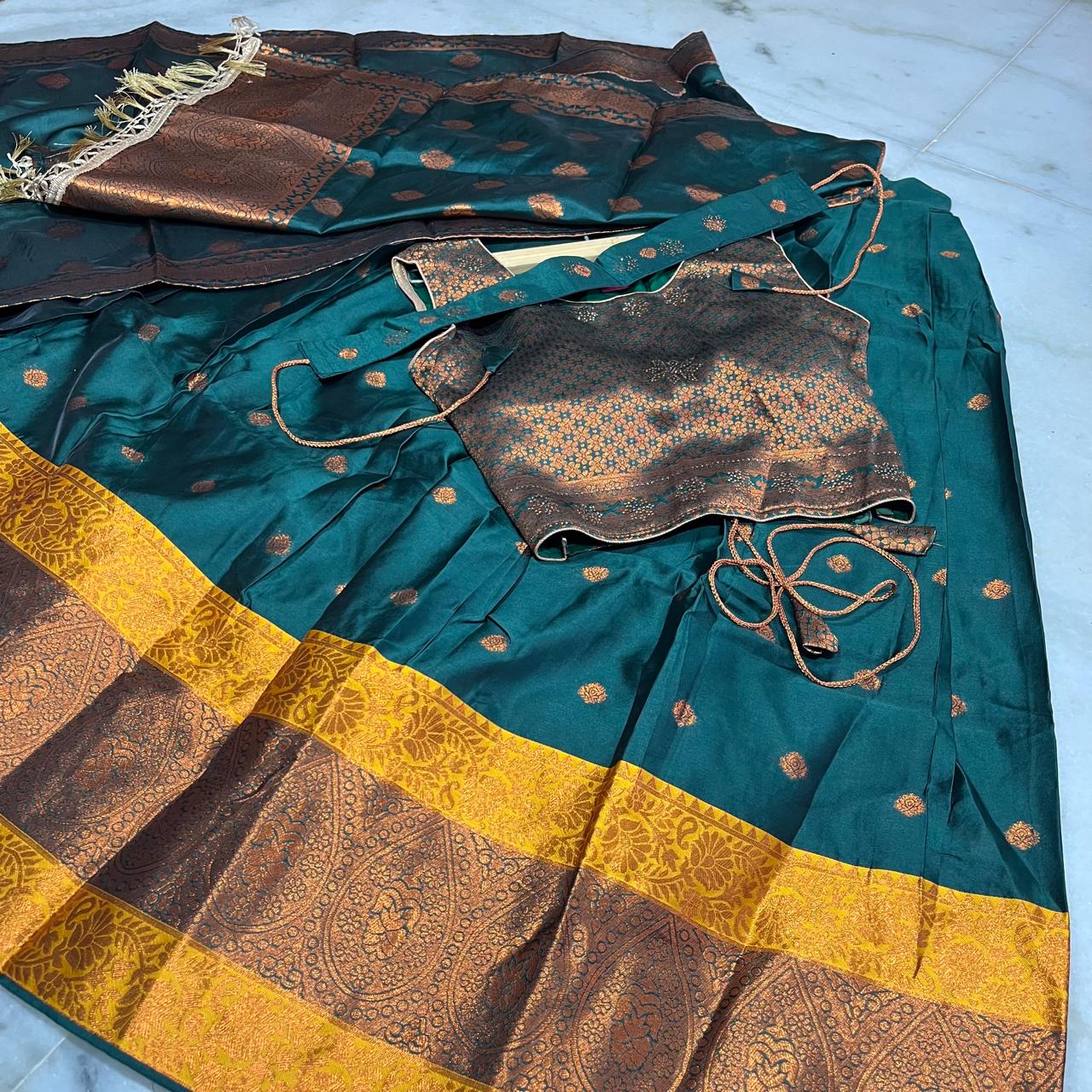 Regal emerald green lehenga set with a richly woven chloi,dupatta & belt