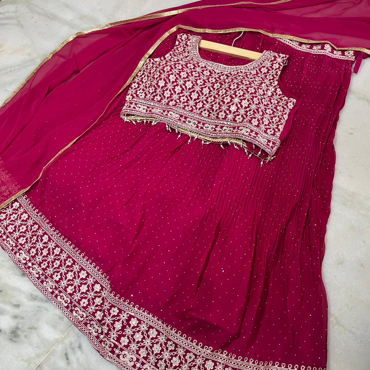Magenta embroidered lehenga choli with dupatta