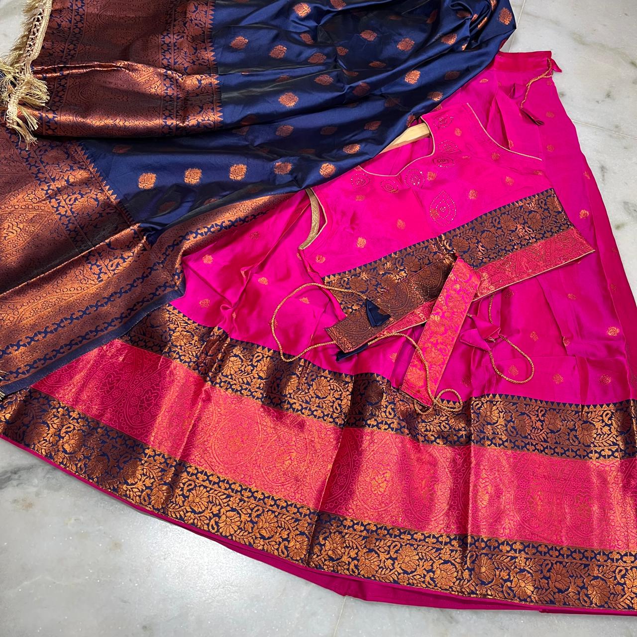 Traditional royal pink and navy blue lehenga choli with rich zari woven borders and belt