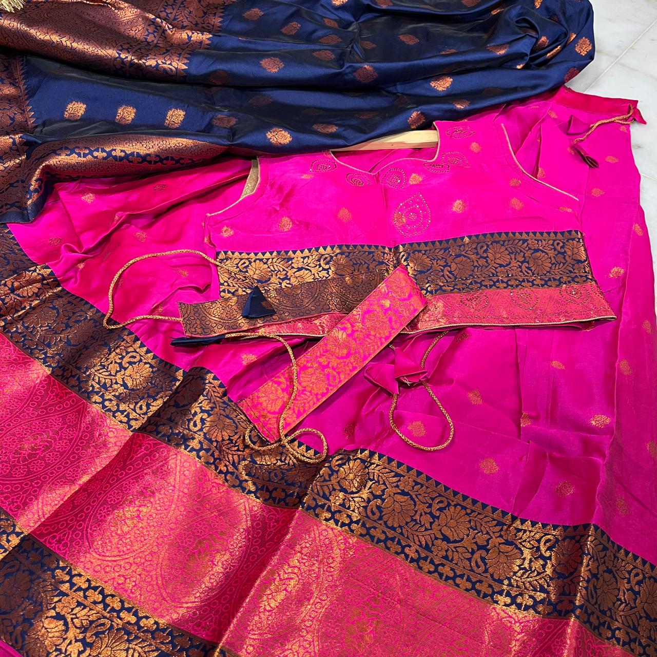 Traditional royal pink and navy blue lehenga choli with rich zari woven borders and belt