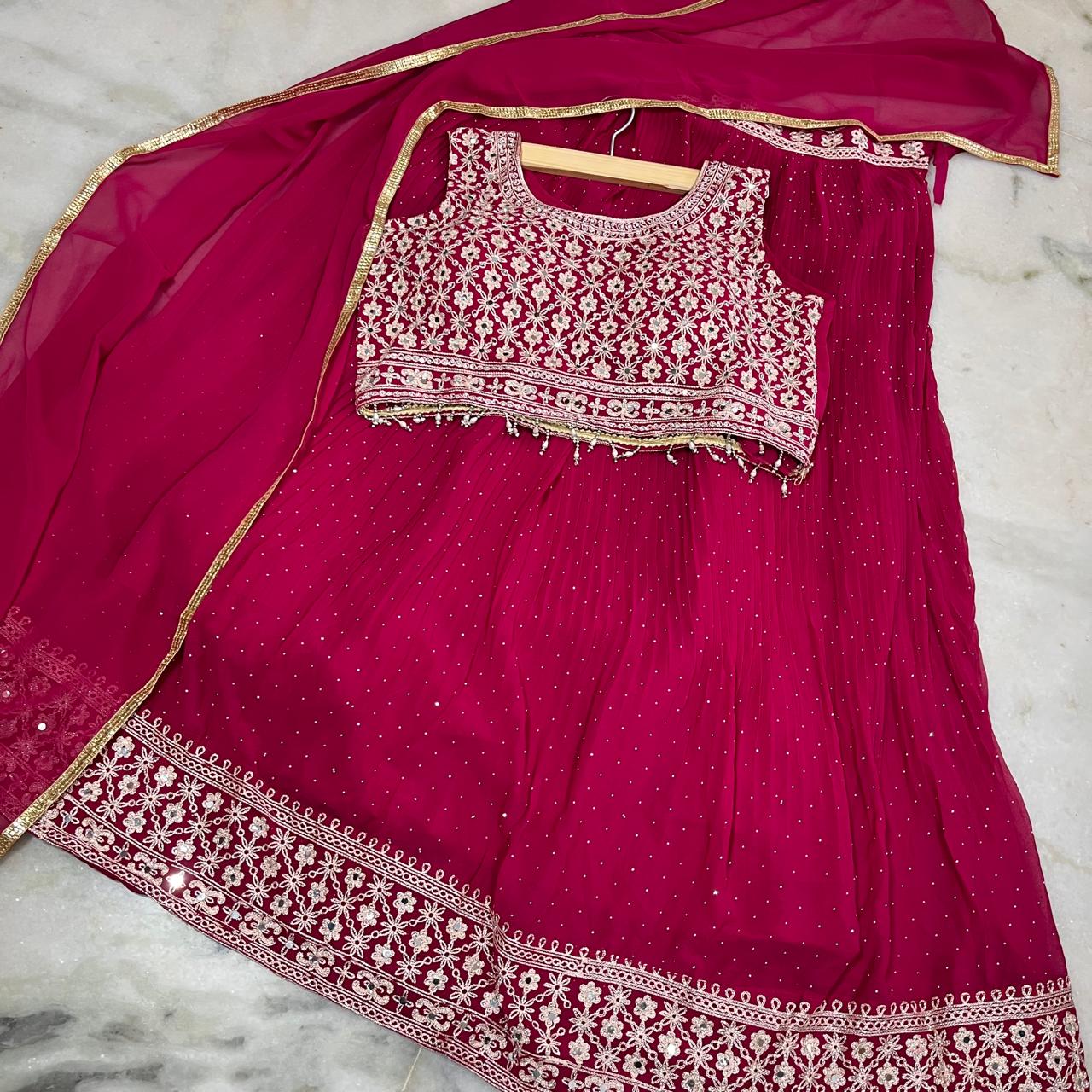 Magenta embroidered lehenga choli with dupatta