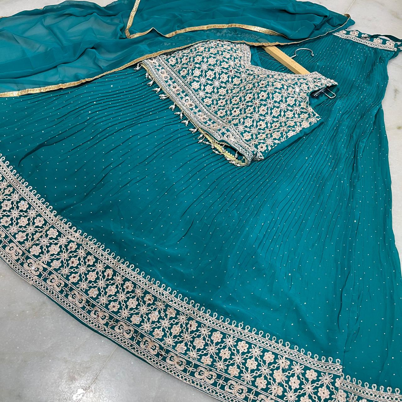 Royal green embroidered lehenga choli with dupatta
