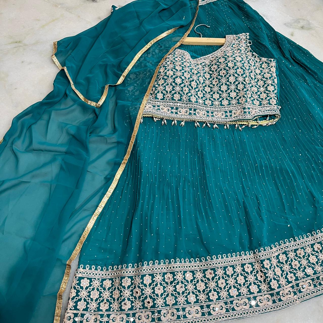 Royal green embroidered lehenga choli with dupatta