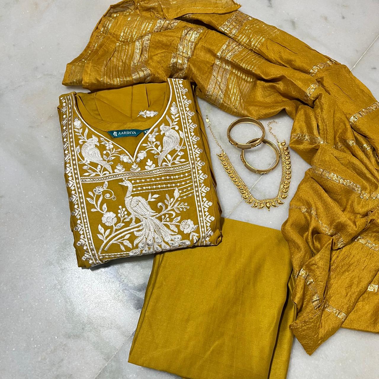 Mustard gold shiny umbrella-cut peacock embroidered kurti set with printed dupatta and pants