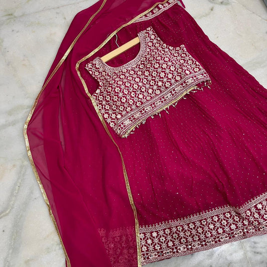 Magenta embroidered lehenga choli with dupatta