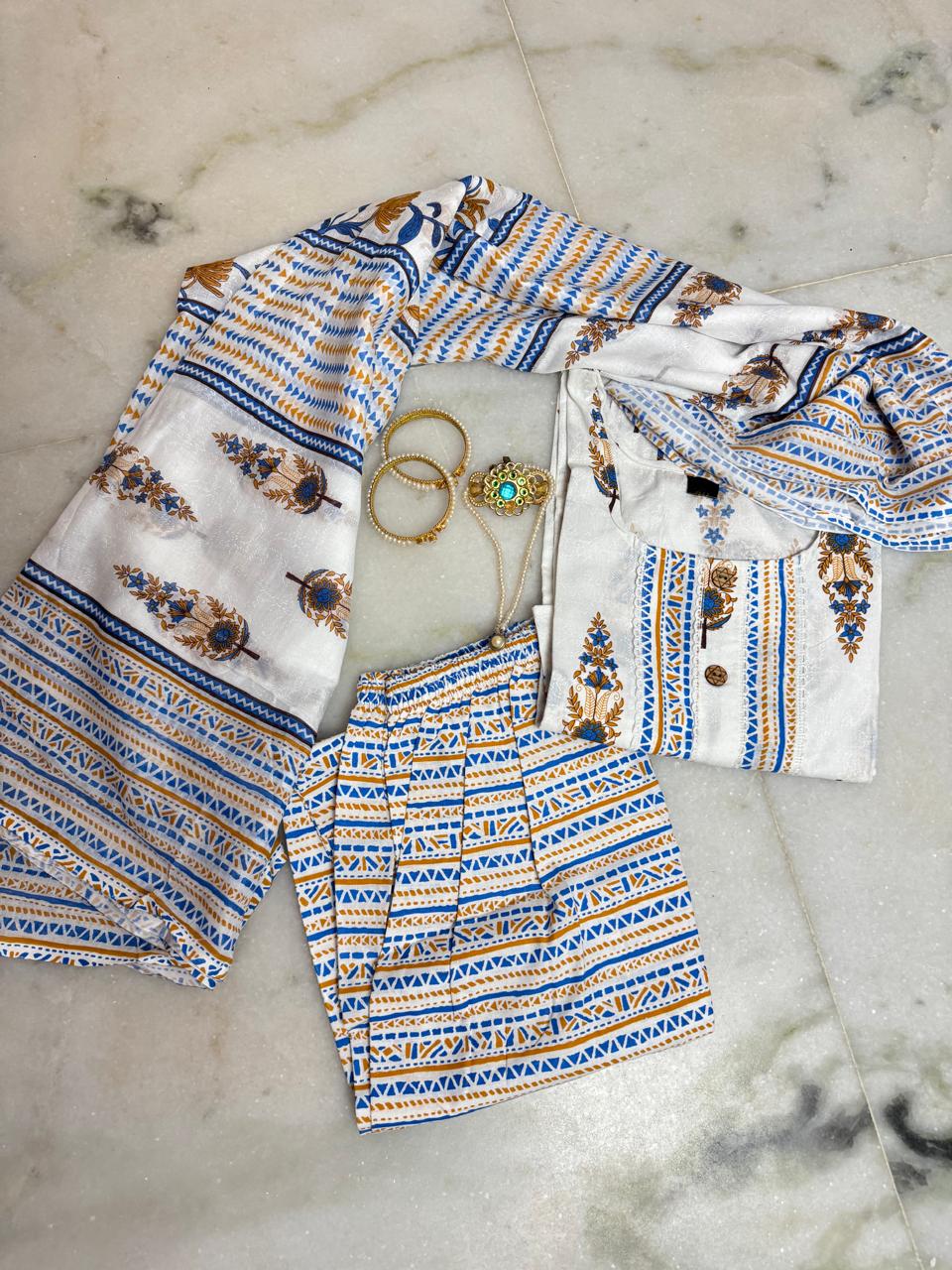 Stylish printed cotton Kurta set with neck embroidery.